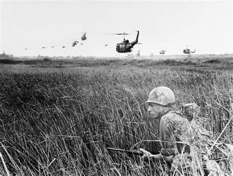 Soldier Crouching In Mekong Delta Photograph By Bettmann Fine Art America