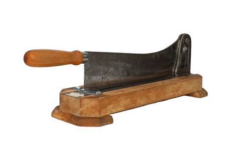 French Baguette Bread Slicer Knife On Wooden Chopping Board