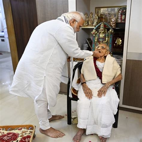 Pm Modis Mother Hirabas 100th Birthday Blessed By Washing Feet And