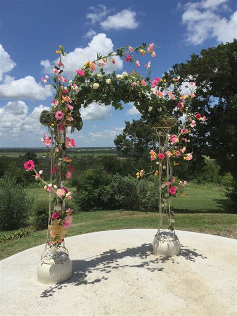Whimsical Arch Decor With Greenery Natural Branches And Pink Flowers