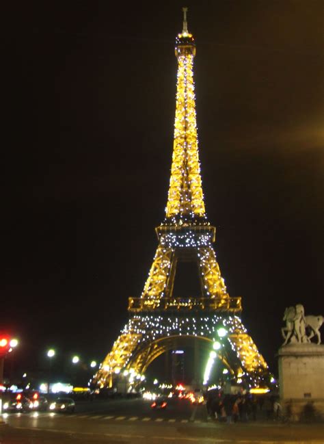 Eiffel Tower A Eiffel Tower At Night Eiffel Tower Famous Buildings