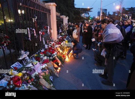 People light candles to commemorate Russian opposition leader Alexei
