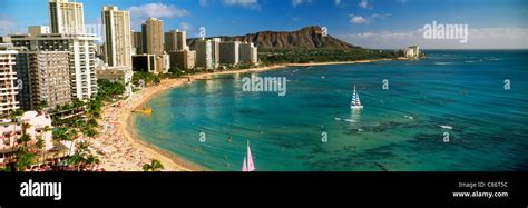 Waikiki Beach And Diamond Head With Beach Front Hotels And Palm Trees