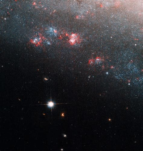 Hubble Captures A Dwarf Spiral Galaxy With Multiple Mysteries