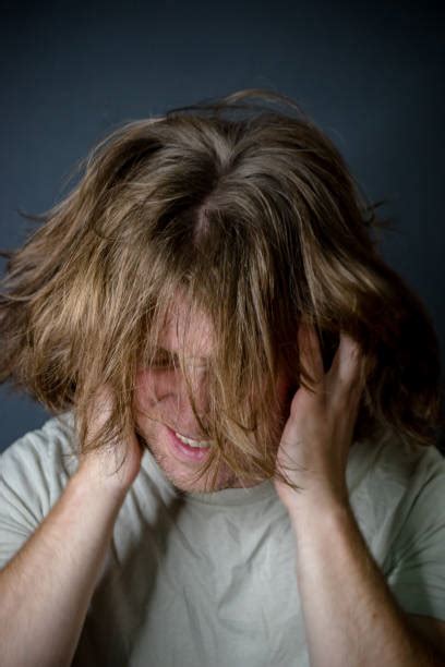 Man Pulling His Hair Out Pics Stock Photos Pictures And Royalty Free