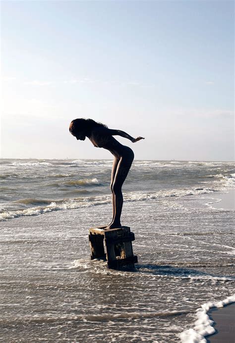 Naked Woman Standing On Crate In The Sea By Rene De Haan Ocean Wave