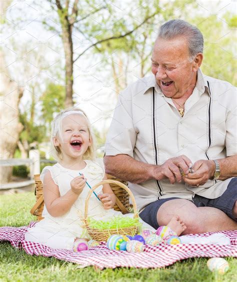 Grandpa And Granddaughter On Easter Stock Photo Containing Man And Male Granddaughter