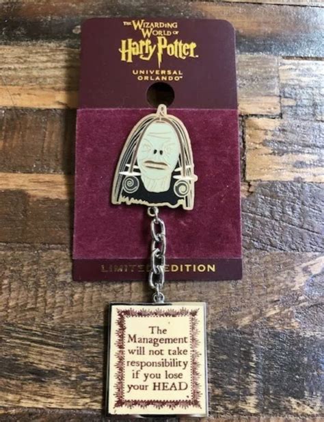 A Harry Potter Keychain With A Quote On The Front And Back Of It