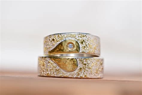 Wedding Rings Hand Forged From Silver With Heart Made Of Gold And