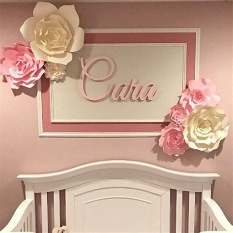 This time around, i decided to embrace soft shades of pink, brown, yellow. Paper flower nursery decor. These large pink paper flowers ...