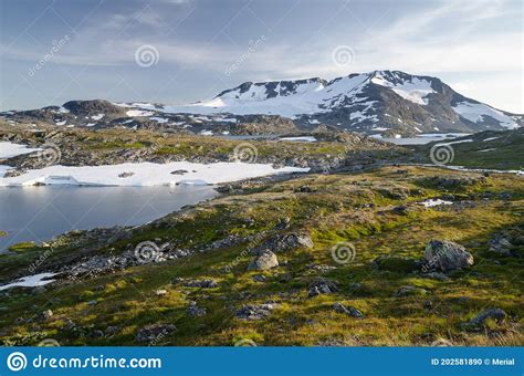 Summer Scenery Of Mountains And Lake In Jotunheimen Norway Stock Photo