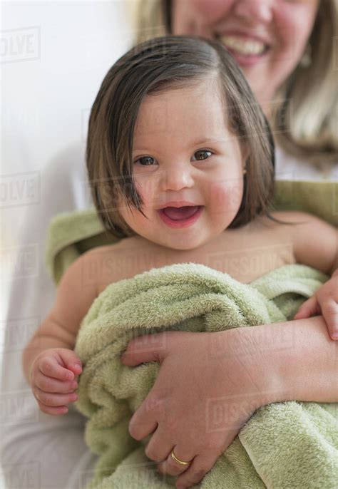 Hispanic Mother Drying Toddler Daughter After Bath Stock Photo Dissolve