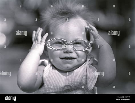 Cute Baby Girl Wearing Funny Glasses Smiling Stock Photo Alamy