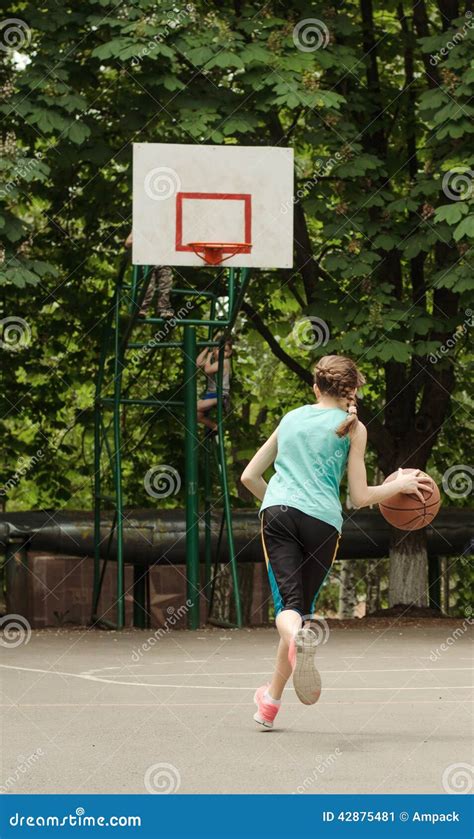 Young Girl Dribbling A Basketball Stock Image Image Of Healthy Court