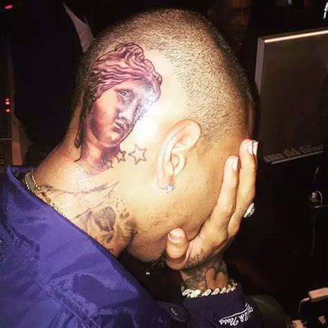 Chris Brown Gets Tattoo On His Head