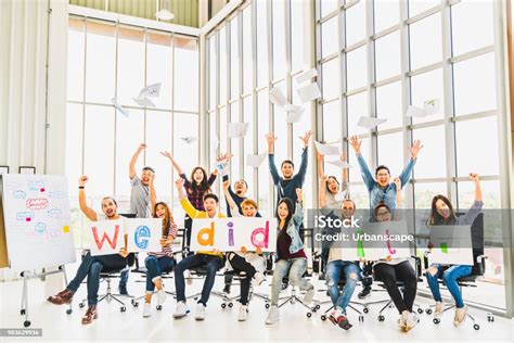 Multiethnic Diverse Group Of Happy Business People Cheering Together
