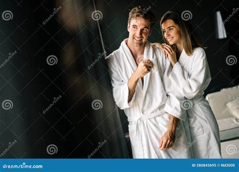 couple in bathrobes enjoying honeymoon in spa resort stock image image of honeymoon bedroom