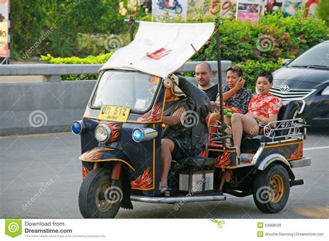 Unidentified Tourist With Traditional Tuk Tuk In Thailand Editorial