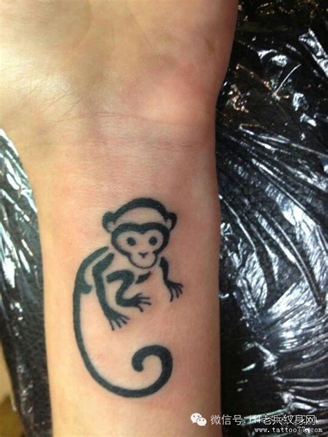 Black Monkey Tattoo On Wrist