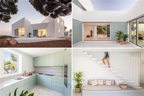 The Modern White Minimalist Exterior Of This Home Is Softened By The