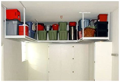 Every available corner is filled with an assortment of items that rarely get used and are constantly in the even if storage space is available in the rafters, it is inconvenient to access the items in storage. garage ceiling storage | Garage-Ceiling-Storage.jpg | Overhead garage storage, Garage storage ...