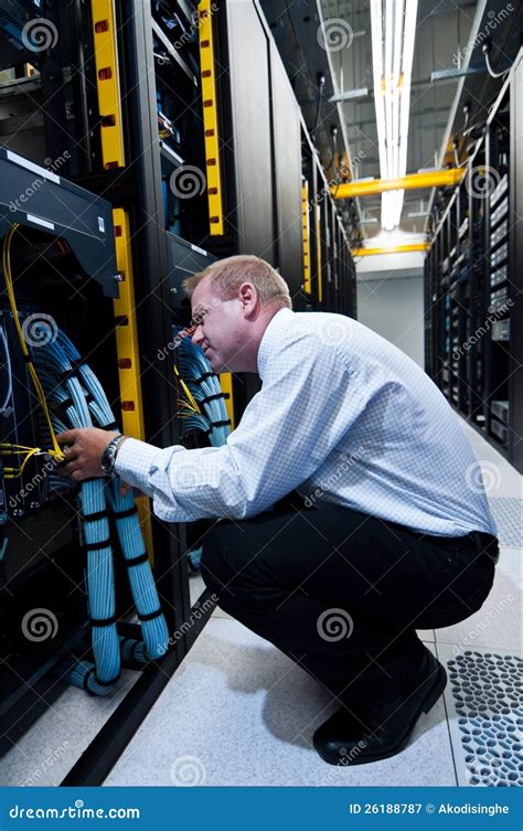 It Technician Working On Network Servers Royalty Free Stock Photography