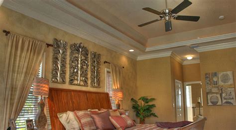 The ancient egyptians started crown molding to decorate their columns and building exteriors. Tray Ceiling with Crown Moulding - RJM Custom Homes