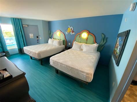 photos video tour a remodeled the little mermaid room at disney s art of animation resort