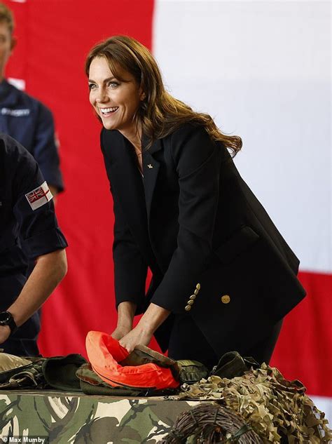 Kate Middleton In Fits Of Giggles As She Tries On A Lifejacket At Royal