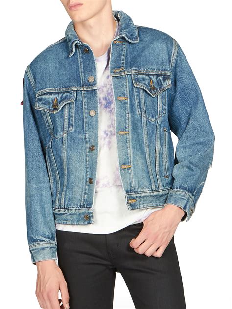 Even though denim jackets for men were originally made as utility gear for cowboys, they quickly became a staple in the everyday wardrobe. Saint Laurent Denim Jacket in Blue for Men - Lyst