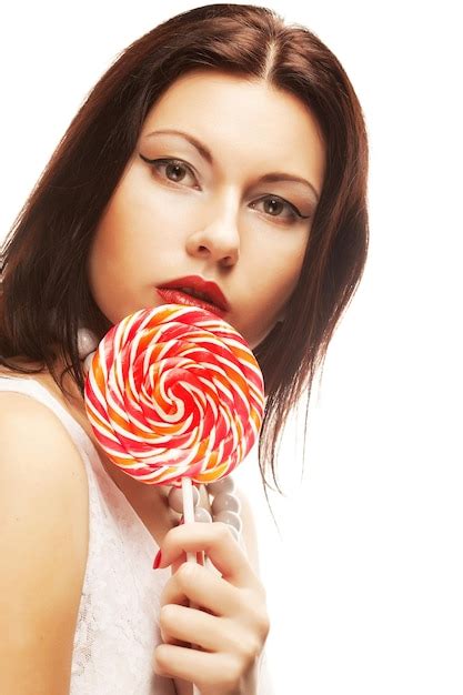 premium photo pretty woman with lollipop