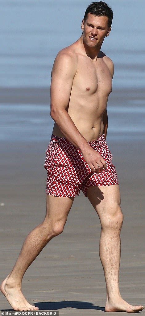 Tom Brady Flaunts Athletic Bod As He Frolics Shirtless On The Beach