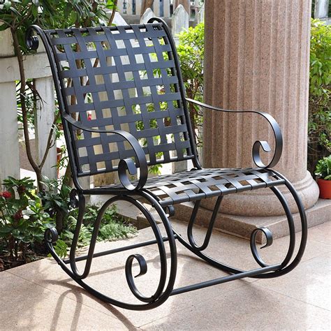 Very elegant, unusually wide, painted wrought this table can be used indoor or outdoors. 15 Collection of Wrought Iron Patio Rocking Chairs
