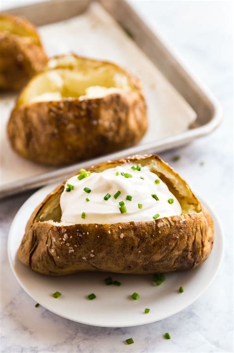 Bake 1 hour or until skin feels crisp but flesh beneath. How long to bake a potato | Cooking, Baked potato oven ...