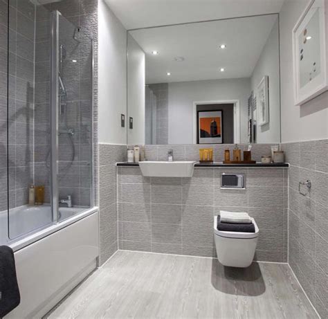 Reducing your bathroom tiling costs. Half-tiled main bathroom of a Taylor Wimpey Gosford ...