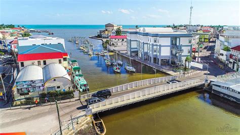 Drone Image Of Downtown Belize Citys Historical Swing Bridge Spanning
