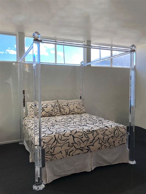 A ladder is used to get up to the top bunk. Clear Lucite and Brass King Size Canopy Bed For Sale at 1stdibs