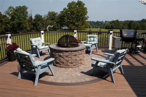 Composite decking is mixture of wood pulp and recycled materials. Decks.com. Deck with Fire Pit & Pergola - Picture 3526