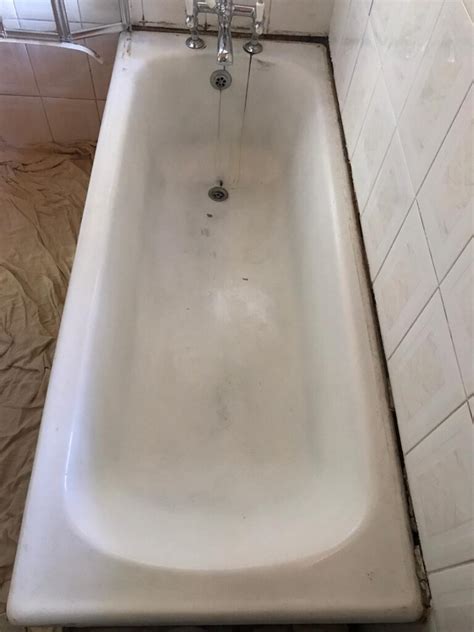 Waterproofing the area where the new bathtub will be installed. Bath Resurfacing Professionals | MCM Bath Re Enamelling London