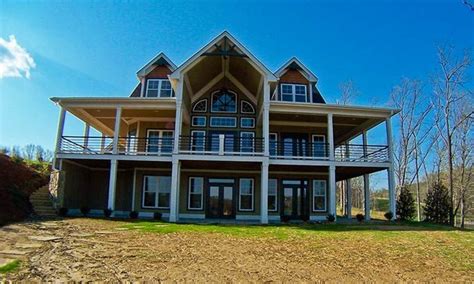 It maximizes a sloping lot, adds square footage without increasing the footprint of the home, and creates another level of outdoor living. Lakefront House Plans with Walkout Basement Unique ...