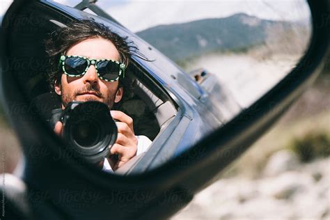 Young Man Taking A Selfie With A Dslr On A Truck Driving Mirror By Alejandro Moreno De Carlos