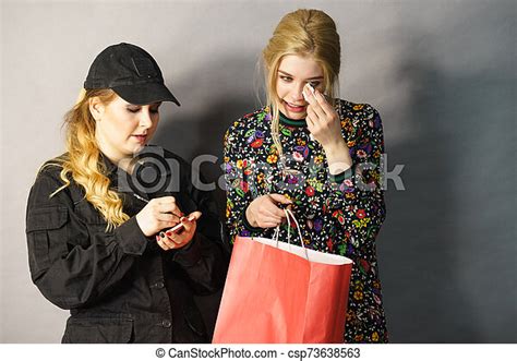 Security Guard And Shoplifter Shoplifting Is A Crime Teenage Girl Being Caught On Stealing