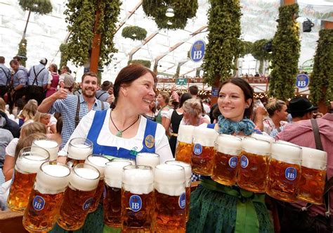Oktoberfest Plastered With Millions Of Happy Germans Tourists Beer