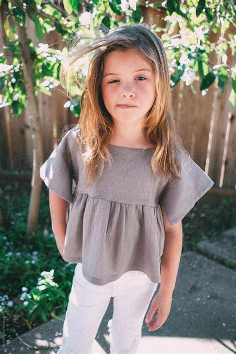 Portrait Of Young Girl Modeling Stylish Clothes porGabrielle Lutze