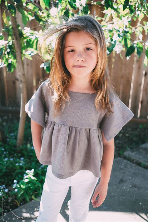 Portrait Of Young Girl Modeling Stylish Clothes By Gabrielle Lutze