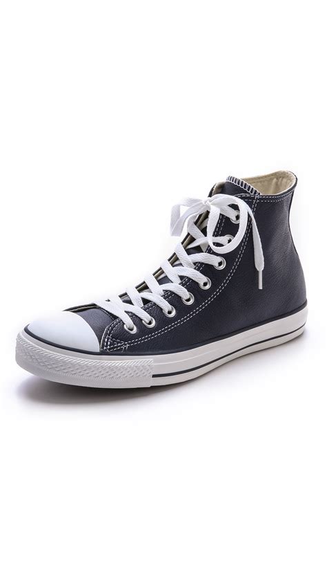 Converse Leather Chuck Taylor High Top Sneakers In Blue