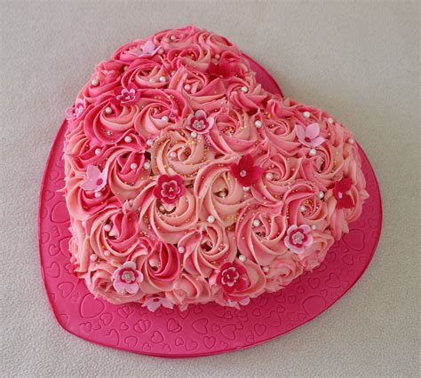 Valentines day is approaching and you still have no idea how to surprise your lover. Pink heart shape cake with buttercream rose swirls ...