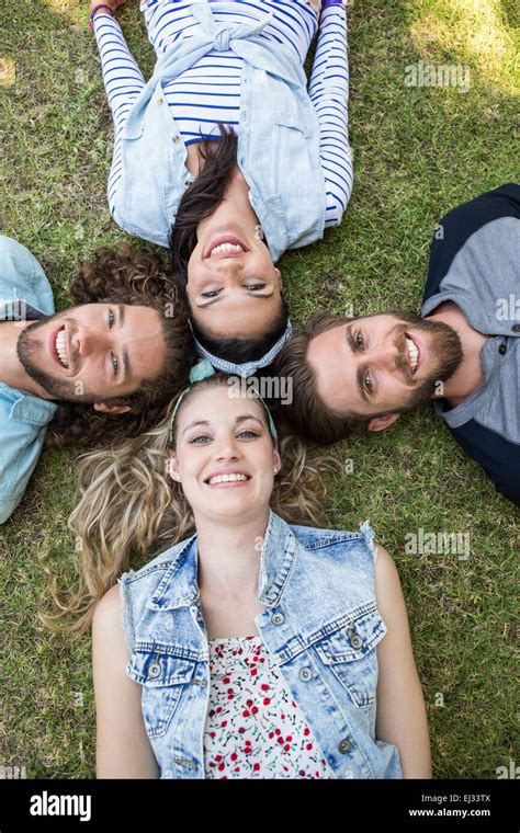 Happy Friends Smiling At Camera Stock Photo Alamy