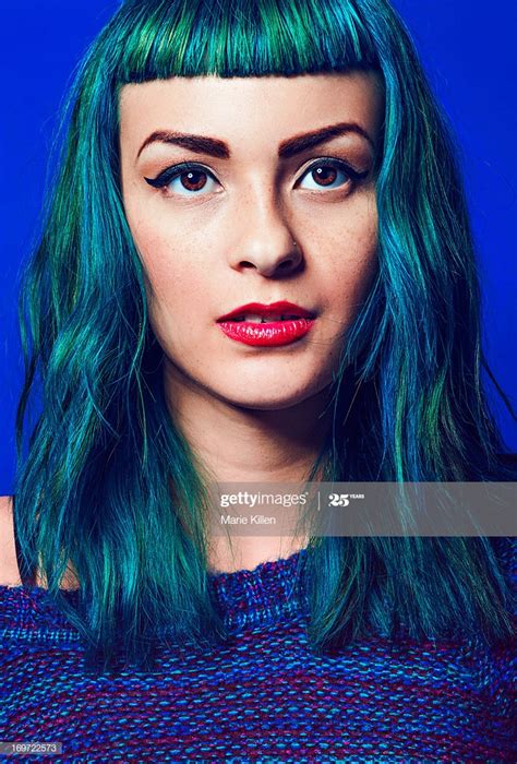 Girl With Short Bangs And Blue And Green Hair High Res