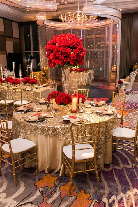 Gold Tables Topped With Tall Red Rose Centerpieces Las Vegas Wedding